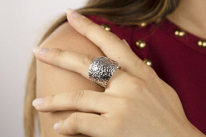 Anello in argento onde diamantato intrecciato