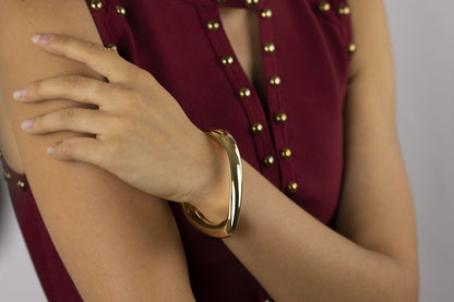 Rigid oval gold-plated silver bracelet