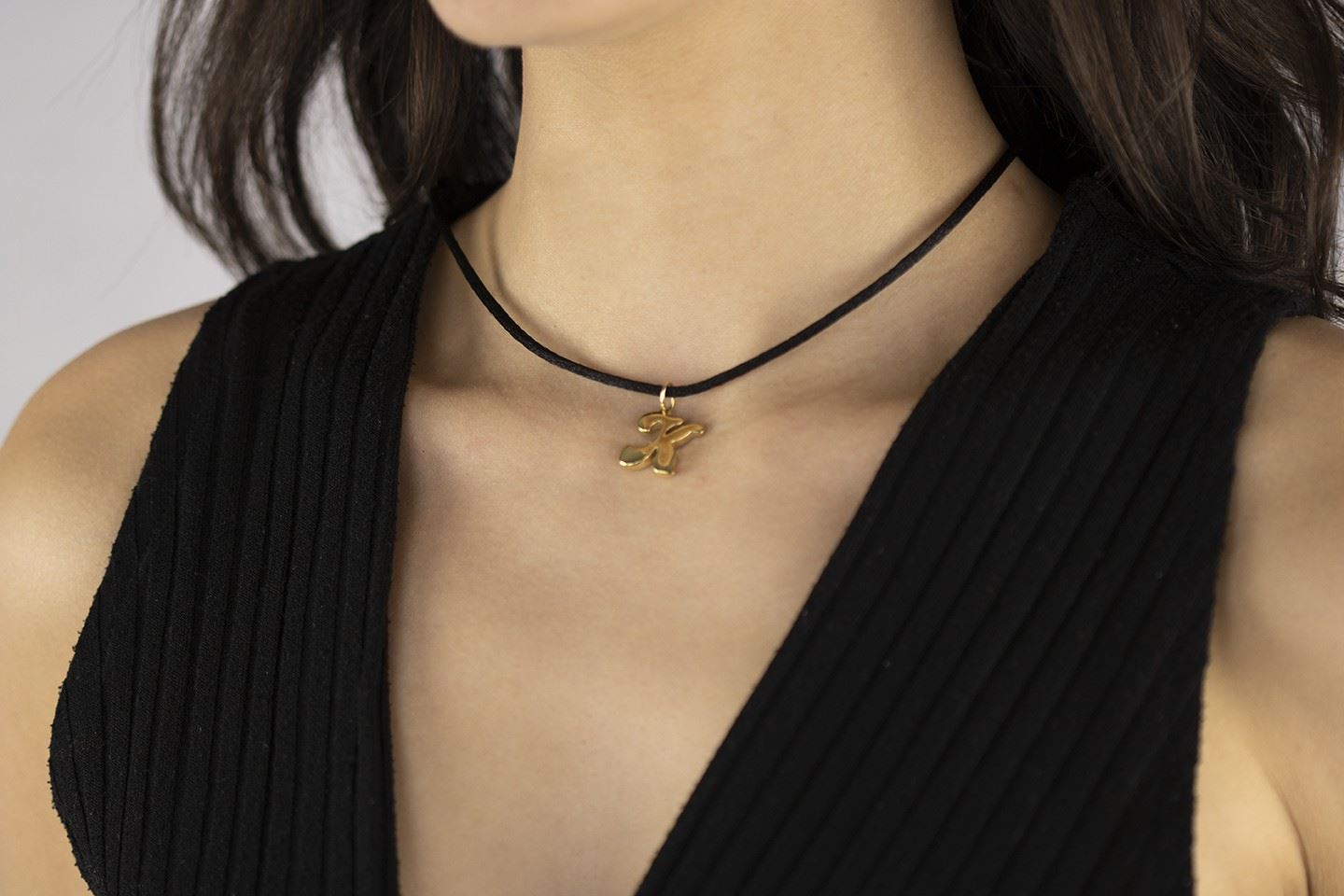 18kt yellow gold initial letter K pendant with lace