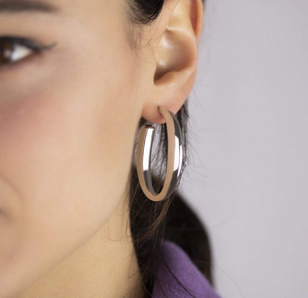 Oval silver earrings with a triangular section, length 40mm