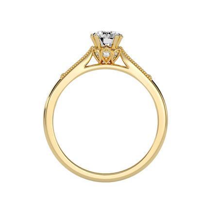 Solitärring mit 0,65 Karat Pavé-Fassung in 18 Karat Gelbgold